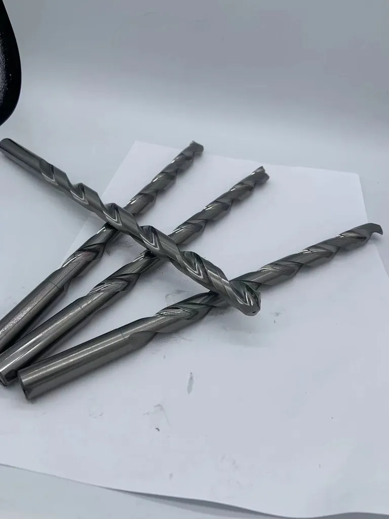 Double margin design drills before coating